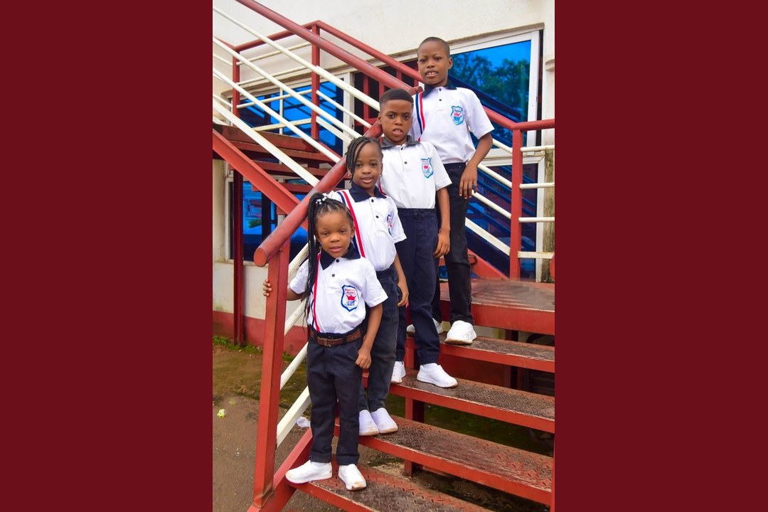 Royal Crystal Academy pupils on staircase